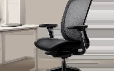 Une chaise ergonomique premium mise en situation dans un espace de travail moderne et épuré. L’image évoque le confort, les réglages et le maintien adaptés aux longues journées devant ordinateur.